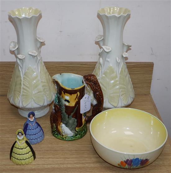 A pair of Belleek vases, a majolica vase, a Clarice Cliff crocus bowl and two Carltonware ceramic lady napkin rings